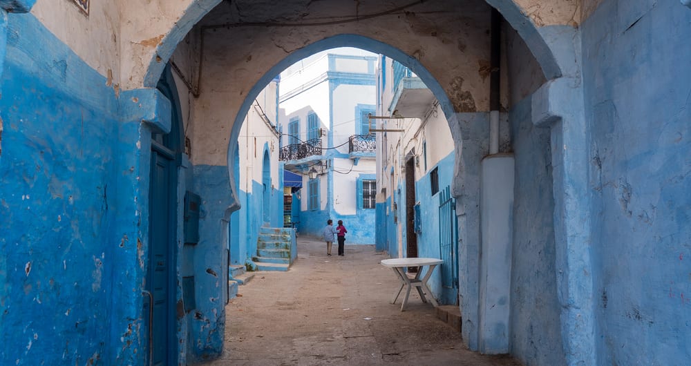 Street with arches in Larache, Morocco