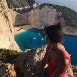 Damaris Osorio in Greece overlooking the bay