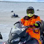Elena on a skidoo in Iceland
