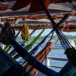 Hammocks on a supplies ferry in Brazil, Amazon river