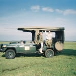 Lauren in Jeep on safari in Kenya