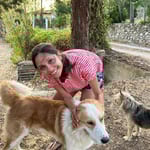 Janine Shroff meeting the dogs of Sicily