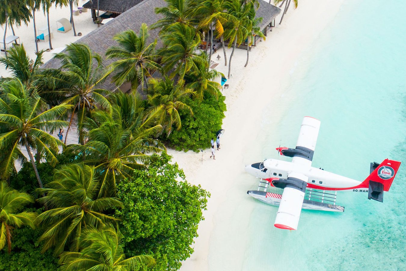 Arrive by plane to the Maldives