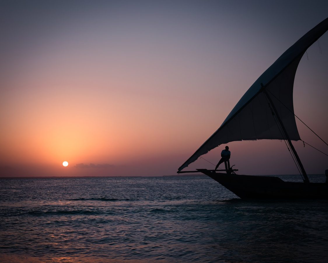 Traditional fishing boat on waters around Dar Es Salaam, Zanzibar, Tanzania