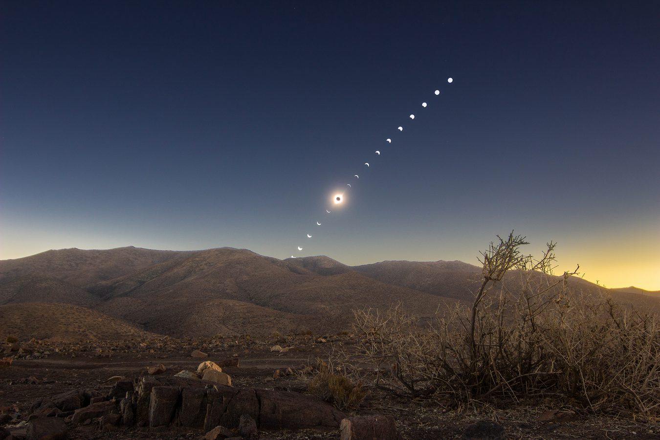 The solar eclipse visible over the desert
