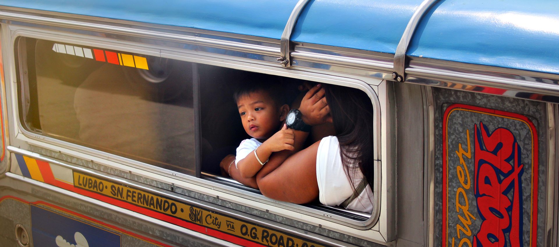 child on train in Central Luzon