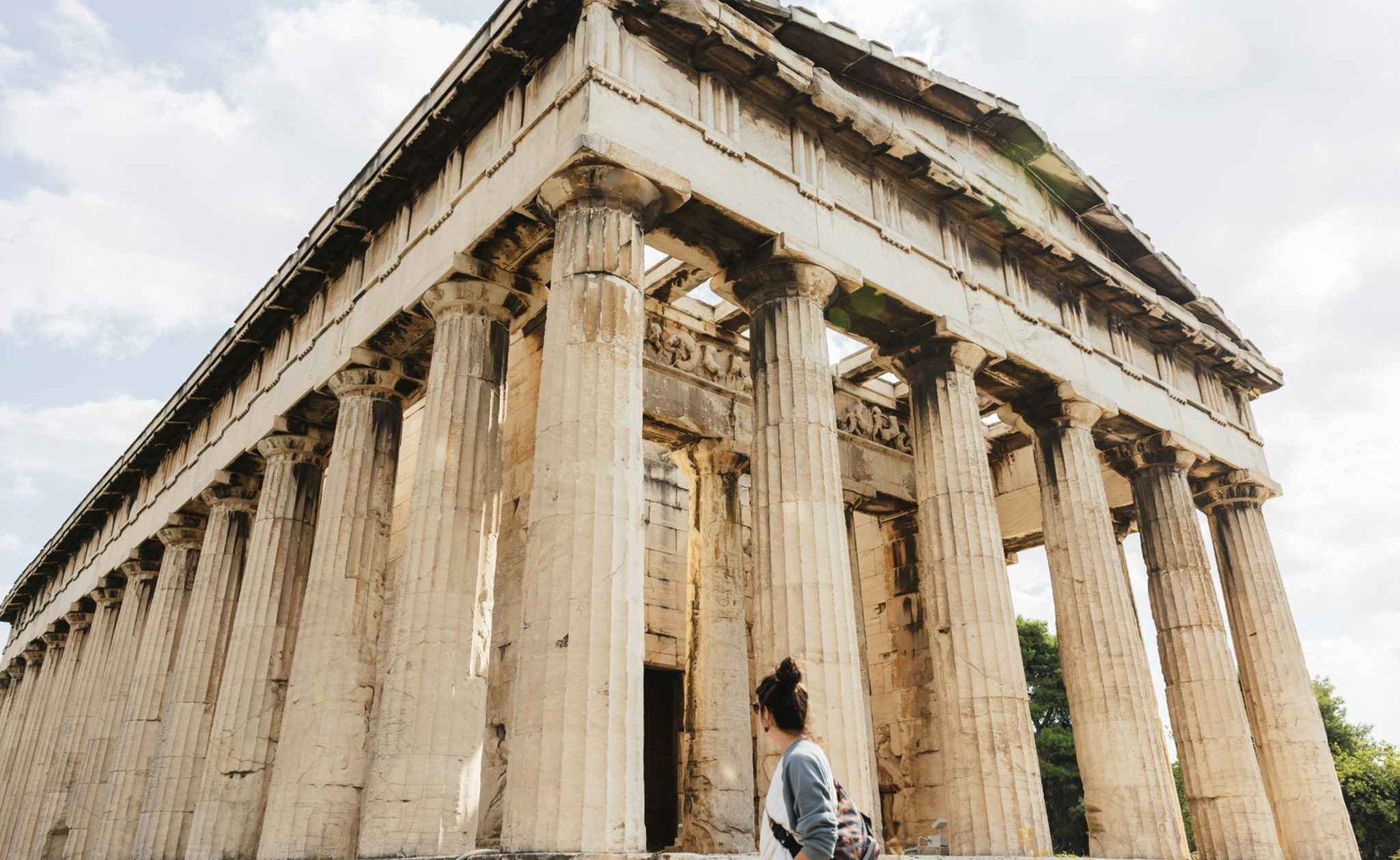 Lady looking up at Parthenon Athens