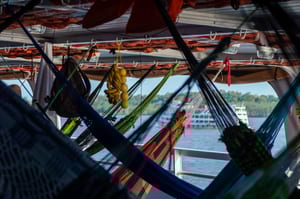Hammocks on a supplies ferry in Brazil, Amazon river