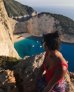 Damaris Osorio in Greece overlooking the bay