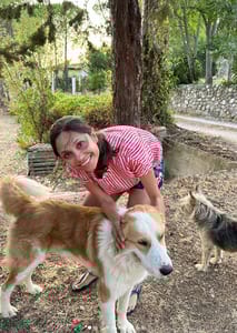 Janine Shroff meeting the dogs of Sicily