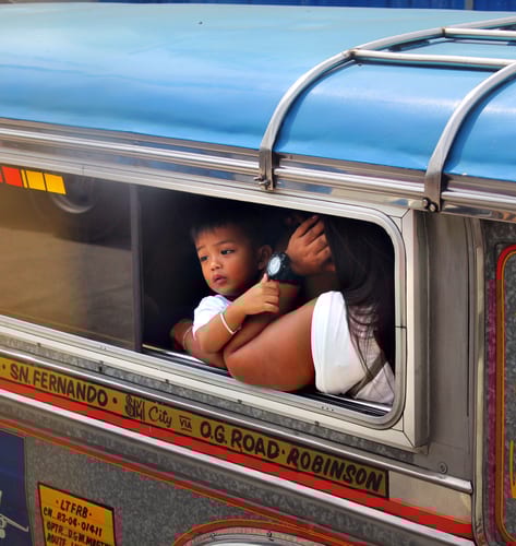 child on train in Central Luzon