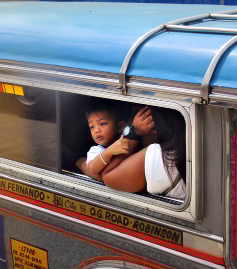 child on train in Central Luzon