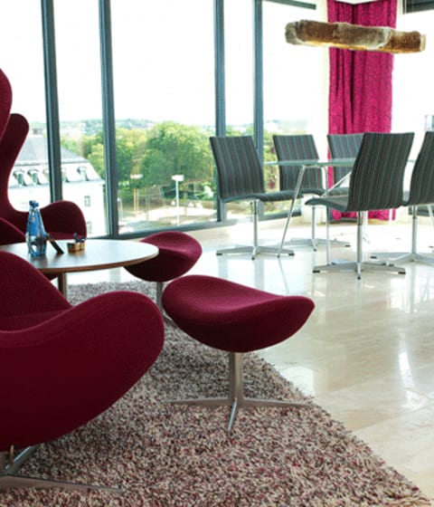 Settle down amongst the light and airy interiors