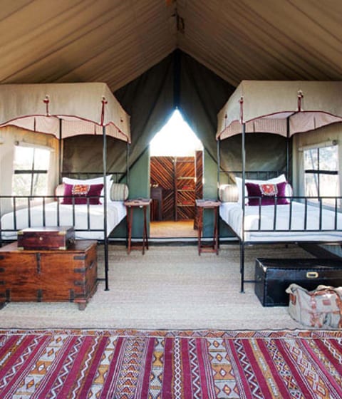 The twin tent has beautiful furniture