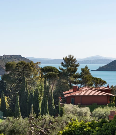garden and sea views at hotel il pellicano in tuscany in italy