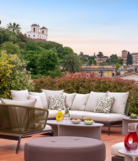 Enjoy views across the city's rooftops from dinner on the Nijinsky Suite terrace
