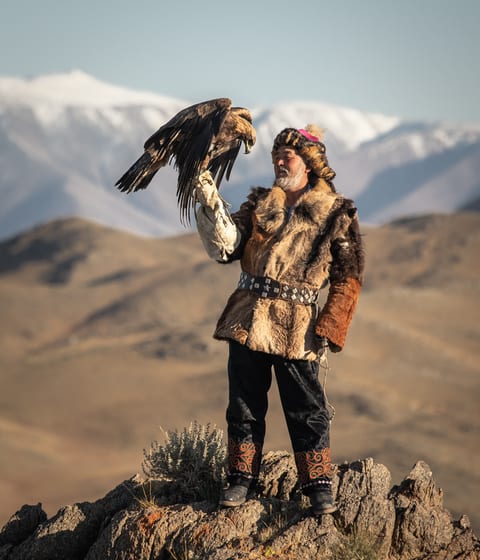 traditional kazakh eagle hunter in mongolia
