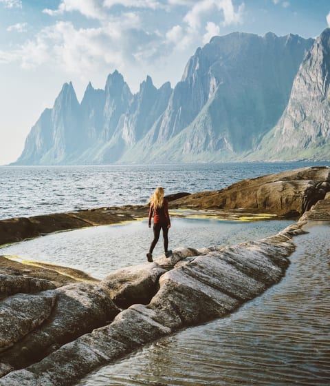 woman hiking in the mountains in norway