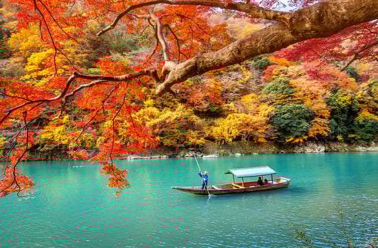 Punting down the river in Kyoto, Japan