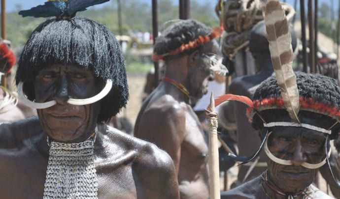 An unusual holiday: meet members of the Dani Tribe