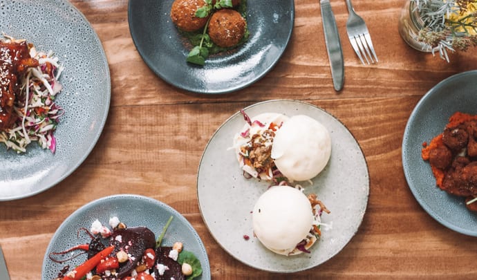 Overhead shot of tapas on a dinner table in Barcelona