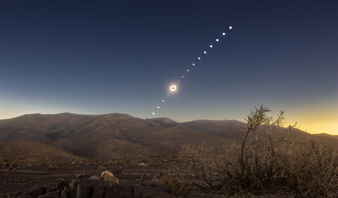 The solar eclipse visible over the desert