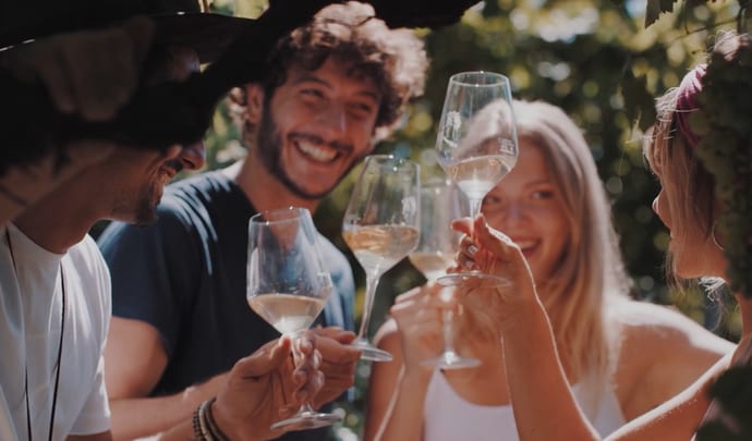Family drinking wine in Italy