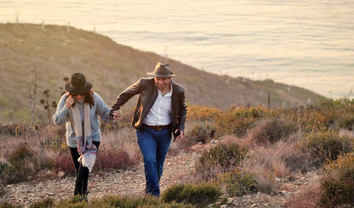 Couple on trail Valle de Guadalupe, Baja California, Mexico
