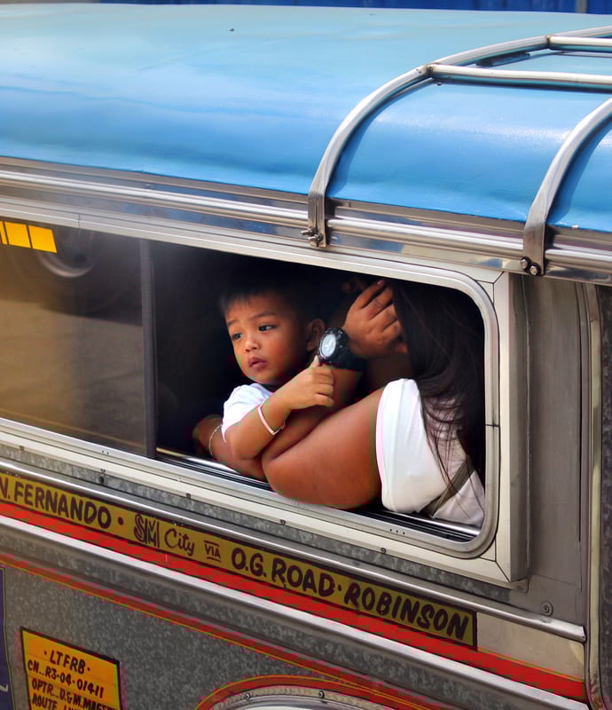 child on train in Central Luzon
