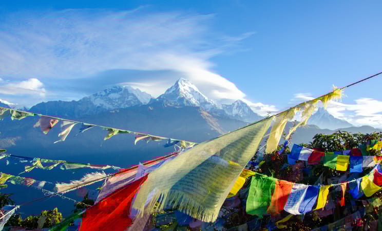 Prayer flags in the Himalayas, Luxury trips to Nepal and Bhutan