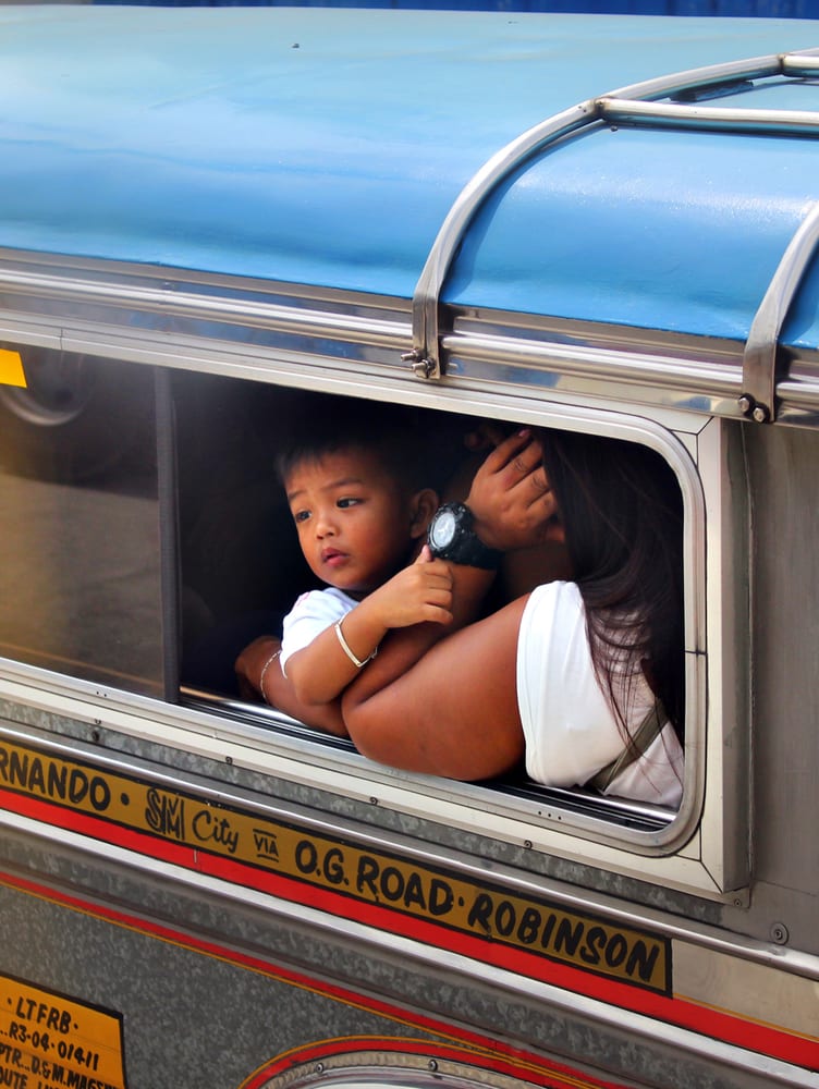 child on train in Central Luzon