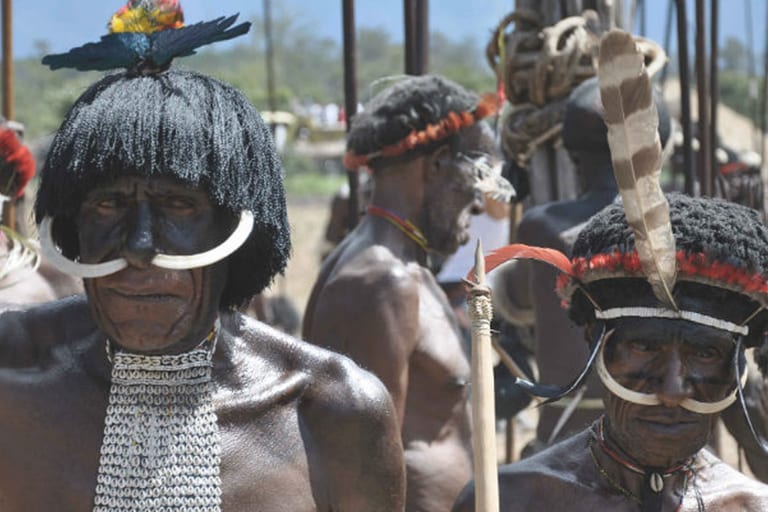 An unusual holiday: meet members of the Dani Tribe