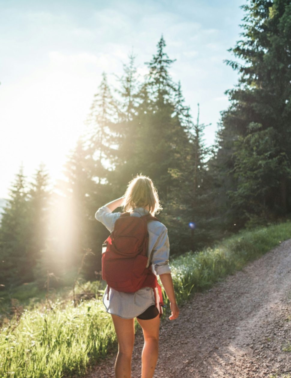Woman hiking in the Swiss Alps