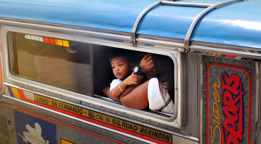 child on train in Central Luzon