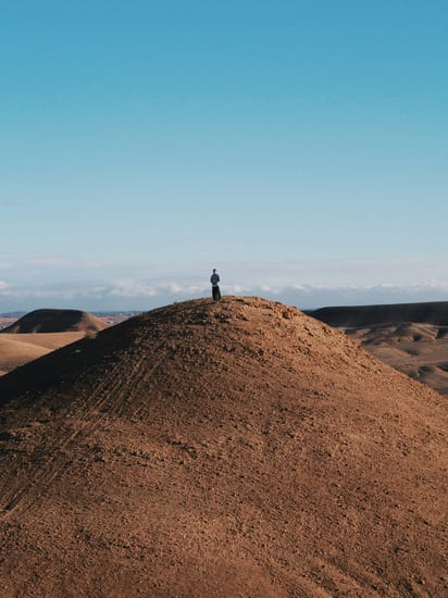 Person looking out over the Agafay desert, Morocco