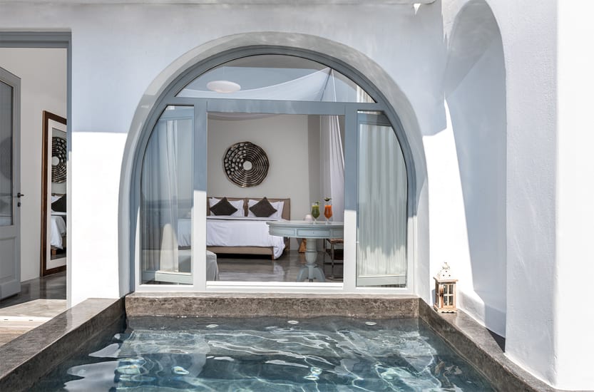 Andronis Luxury Suites bedroom and pool