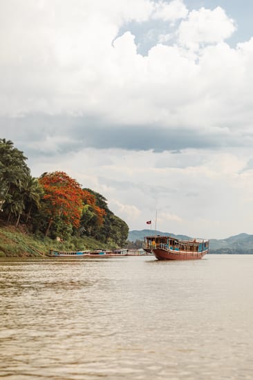 riverboat cruise on the mekong river in luang prabang in laos