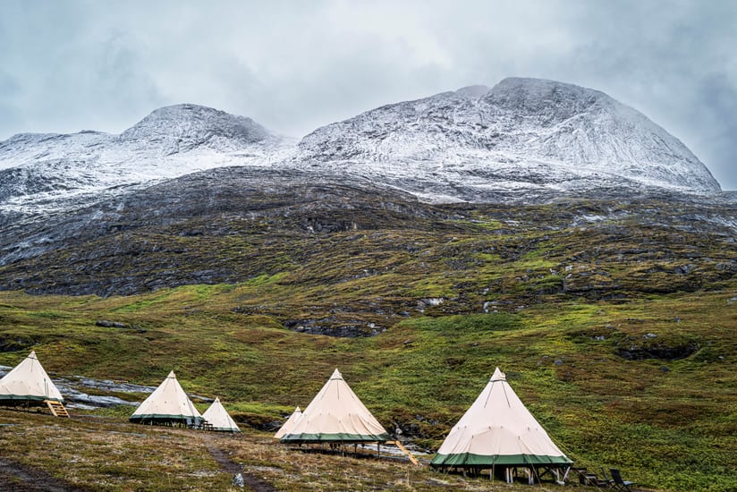 mountains and tents at camp kiattua in greenland