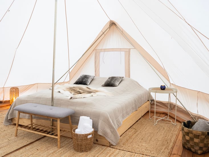 bed at camp saqqaq in disko bay in greenland