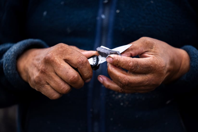 fisherman's hands in saqqaq village in disko bay in greenland